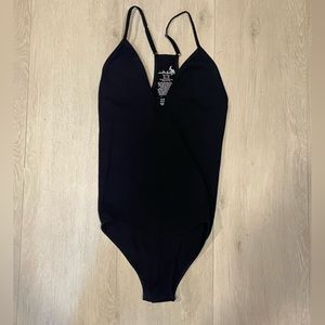 INTIMATELY FREE PEOPLE. Never worn. Size XS.